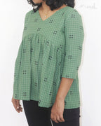 Russian Green Alia Cut Peplum Top